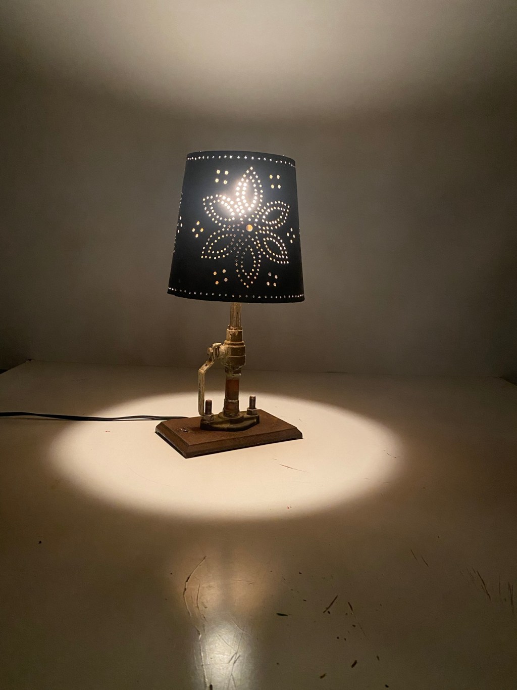 Punched metal lamp